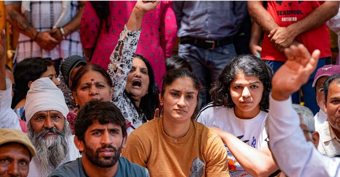 Bajrang Punia, Vinesh Phogat and Sakshi Malik Bajrang Punia, Vinesh Phogat and Sakshi Malik with supporters during their protest at Jantar Mantar in New Delhi on Wednesday. Photo: PTI/Vijay Verma
