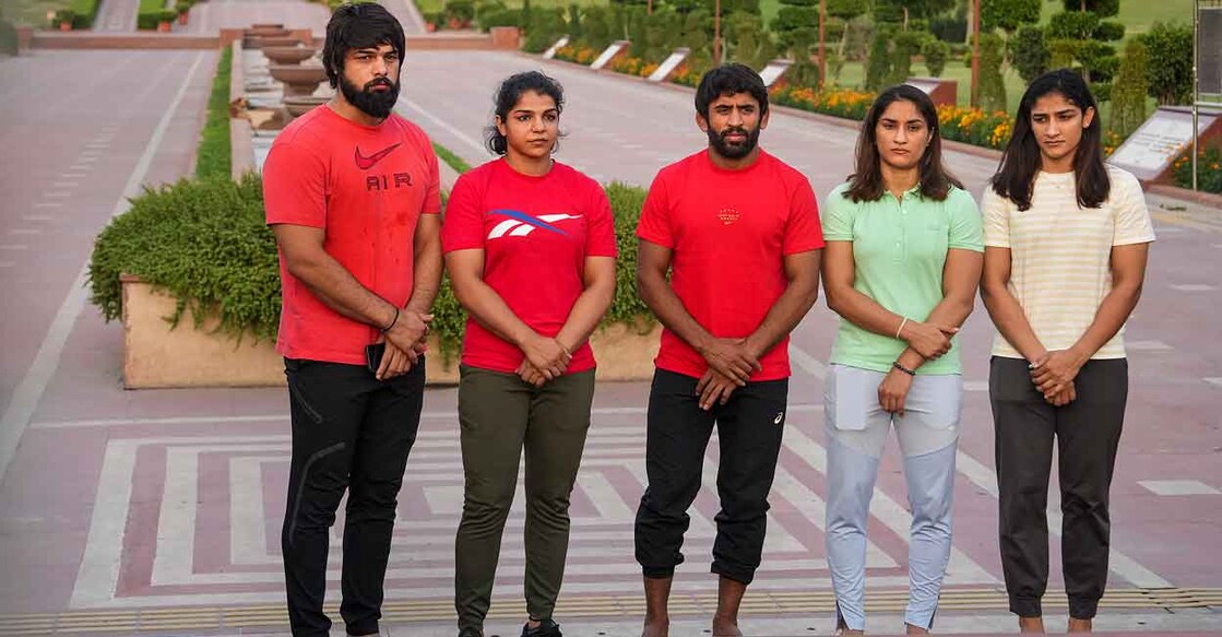 Wrestlers Satyawart Kadian, Sakshi Malik, Bajrang Punia, Vinesh Phogat and Sangeeta Phogat at Rajghatin New Delhi. File photo: PTI/Arun Sharma