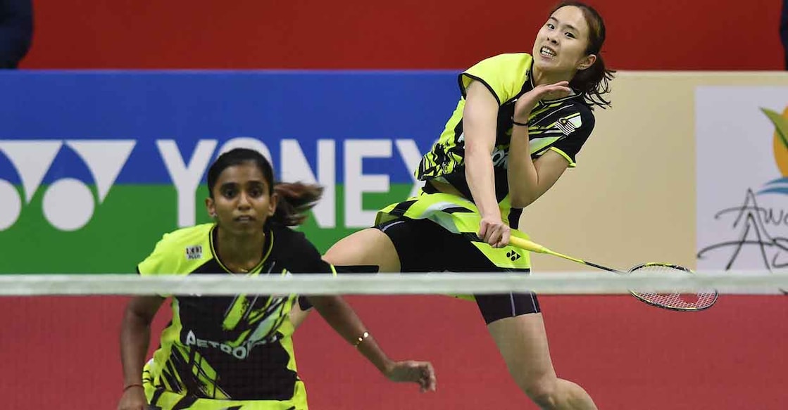 Malaysia's Pearly Tan, right, and Thinaah Muralitharan won the rally and the match. File photo: AFP/Shashi Shekhar Kashya