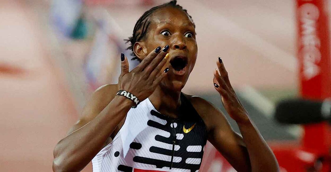 Kenya's Faith Kipyegon celebrates setting a new world record. Photo: Reuters/Ciro De Luca