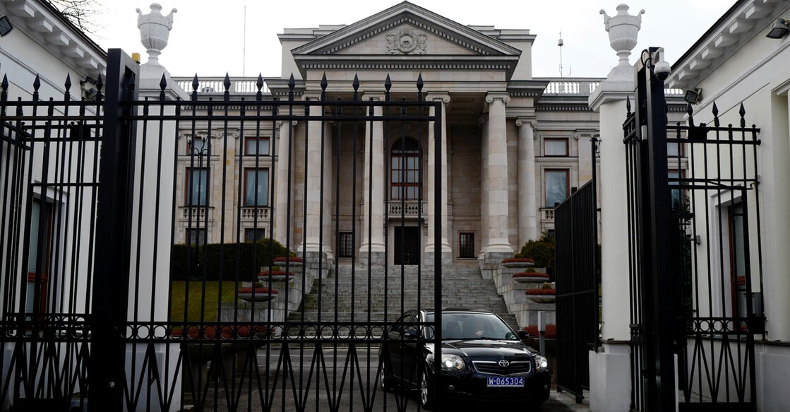 A car leaves through the gate of the Russian embassy building in Warsaw. File photo: Reuters/Kacper Pempel