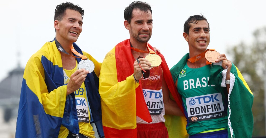Gold medallist Alvaro Martin flanked by silver medallist Sweden's Perseus Karlstrom, right, and bronze medallist Brazil's Caio Bonfim. Photo: Reuters/Bernadett Szabo