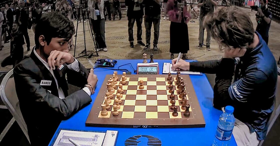 Indian GM R Praggnanandhaa and Norway's GM and World No. 1 player Magnus Carlsen during the final match of the Chess World Cup 2023, in Baku, Azerbaijan, Photo: PTI