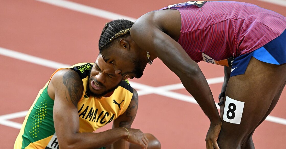 Andrew Hudson & Noah Lyles Andrew Hudson and Noah Lyles react after the men's 200m semifinals. Photo: AFP/Attila Kisbenedek