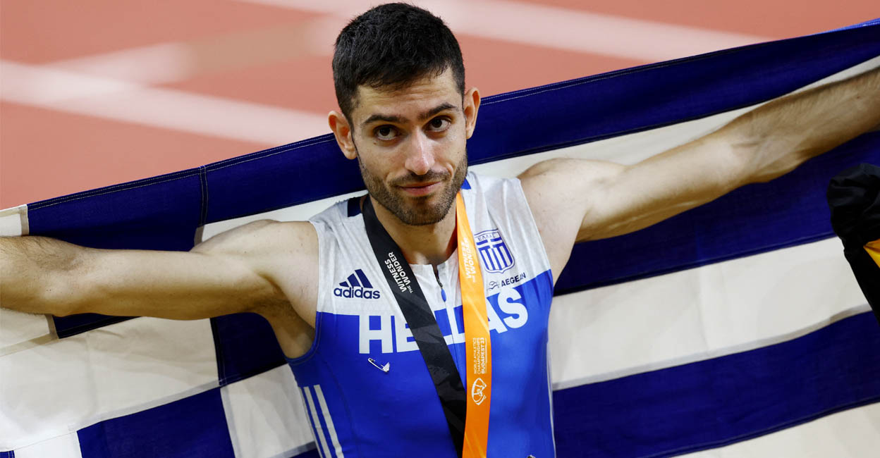 Greece's Miltiadis Tentoglou celebrates with the gold medal after winning the Men's Long Jump in World Athletics Championship. Photo: REUTERS/Bernadett Szabo