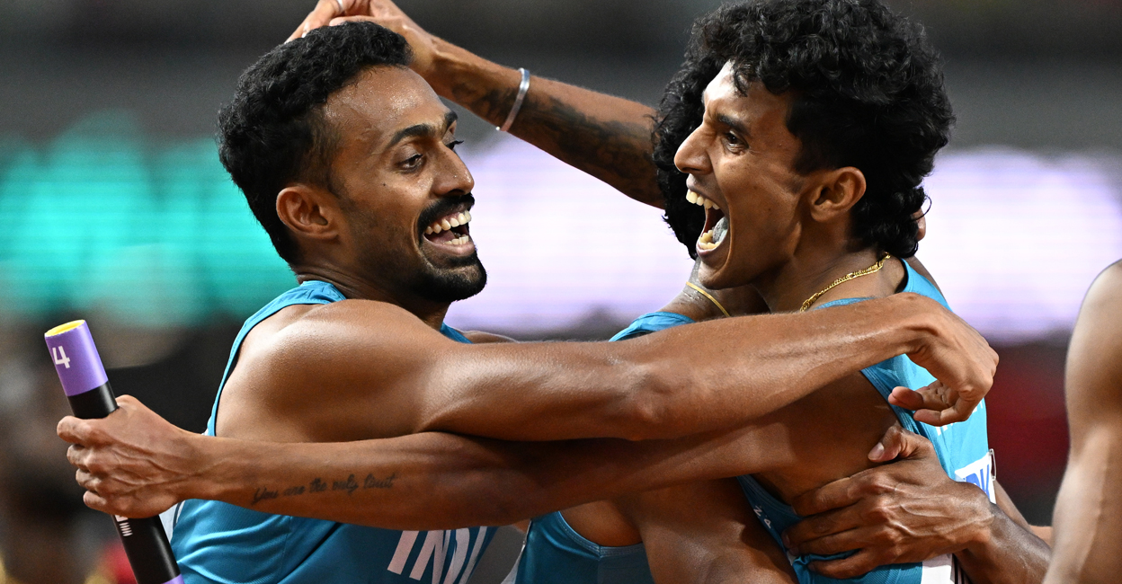 ATHLETICS-WORLD-2023 India's Muhammed Anas Yahiya (left) celebrates with Rajesh Ramesh after the men's 4x400m relay heats during the World Athletics Championships at the National Athletics Centre in Budapest on Saturday. Photo: AFP/ Jewel Samad