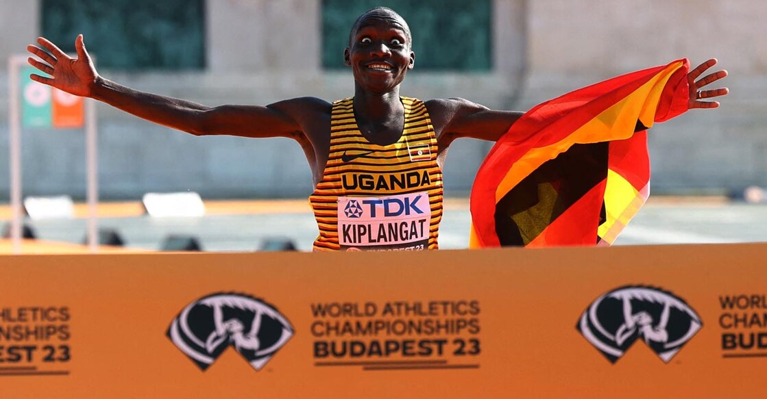 Victor Kiplangat crosses the finishing line. Photo: Reuters/Bernadett Szabo