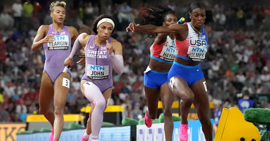 Alexis Holmes of the US fails to collect the baton from Quanera Hayes. File photo: Reuters/Sarah Meyssonnier