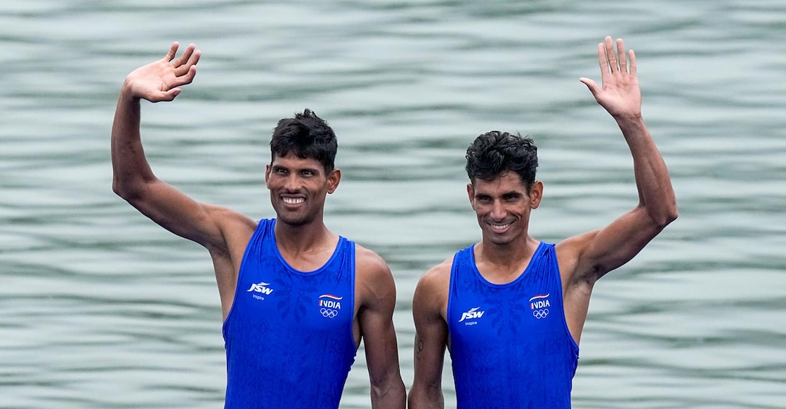 Arjun Lal Jat and Arvind Singh celebrate after winning the silver medal. Photo: PTI/Gurinder Osan