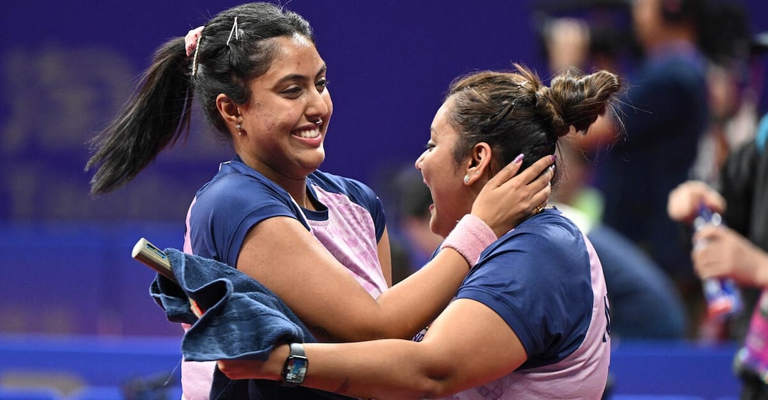 Ayhika Mukherjee and Sutirtha Mukherjee Ayhika Mukherjee and Sutirtha Mukherjee celebrate their stunning win. Photo: AFP/Jung Yeon-je