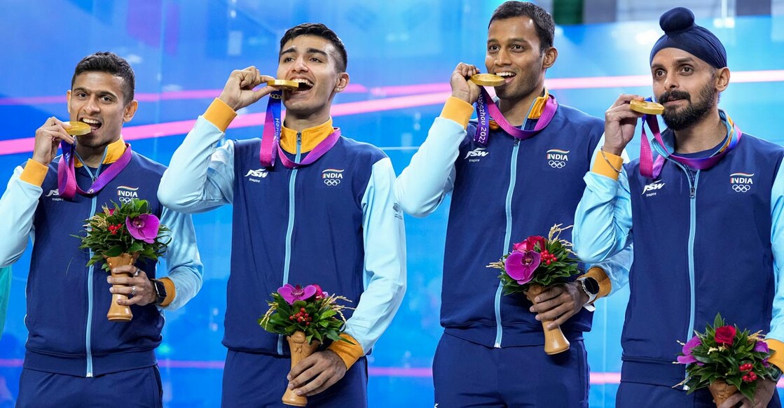 From left: Saurav Ghosal, Abhay Singh, Mahesh Mangaonkar and Harinder Pal Sandhu pose with the medals. Photo: PTI/Shailendra Bhojak)