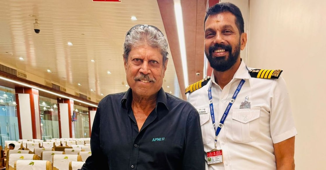 SA Madhu (right) with Kapil Dev at the Cochin International Airport. Photo Special Arrangement