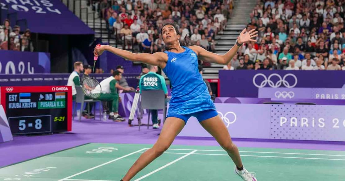 Paris: India's PV Sindhu returns to Estonia's Kristin Kuuba during the women's singles group play stage badminton match at the 2024 Summer Olympics, in Paris, France, Wednesday, July 31, 2024. Sindhu won the macth. (PTI Photo/Ravi Choudhary)(PTI07_31_2024_000281B)