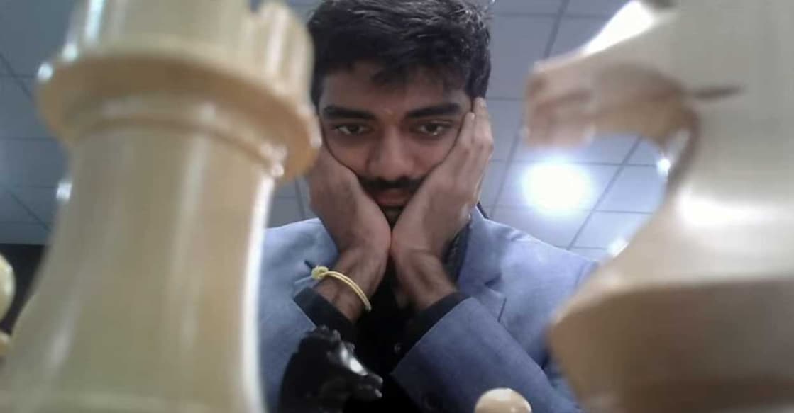 D Gukesh of India in action against Ding Liren of China in Game 2 of their World Chess Championship match in Singapore. Photo: Screengrab/FIDE