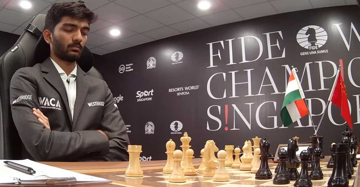 D Gukesh meditates during Game 3 of the World Chess Championship against Ding Liren. Photo: Screengrab/FIDE