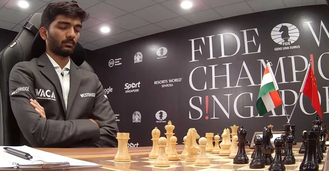 D Gukesh meditates during Game 3 of the World Chess Championship against Ding Liren. Photo: Screengrab/FIDE