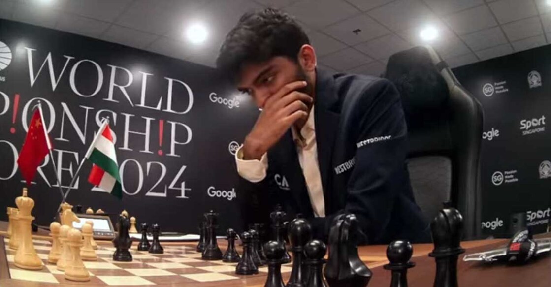 D Gukesh ponders over a move in Game 4 of the World Chess Championship against Ding Liren. Photo: Screengrab/FIDE