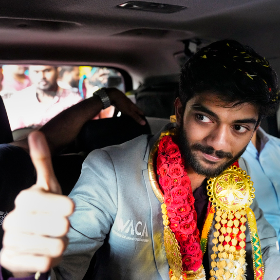 PTI12_16_2024_000070A World Chess Champion D Gukesh upon his arrival at the airport in Chennai on Monday. Photo: PTI