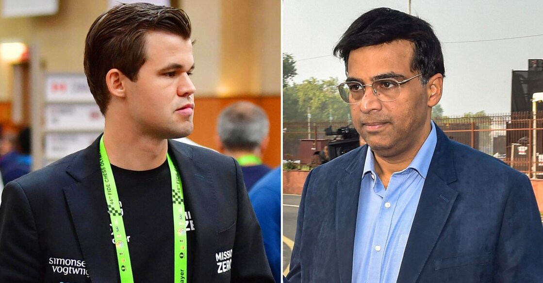 Magnus Carlsen and Viswanathan Anand. File photo: AFP/PTI