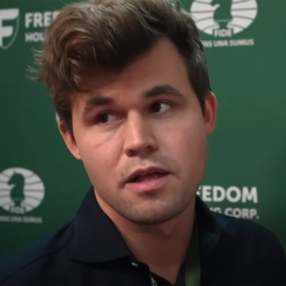 Magnus Carlsen arrived late for his Game 1 of World Blitz Chess Championship against  Michael Bezold of Germany. Photo: Screengrab/FIDE