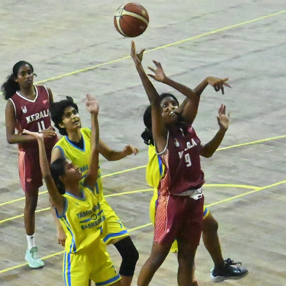Action between Tamil Nadu (yellow) and Kerala in the semifinals of Youth National Basketball Championship in Kolkata. Photo: Special arrangement