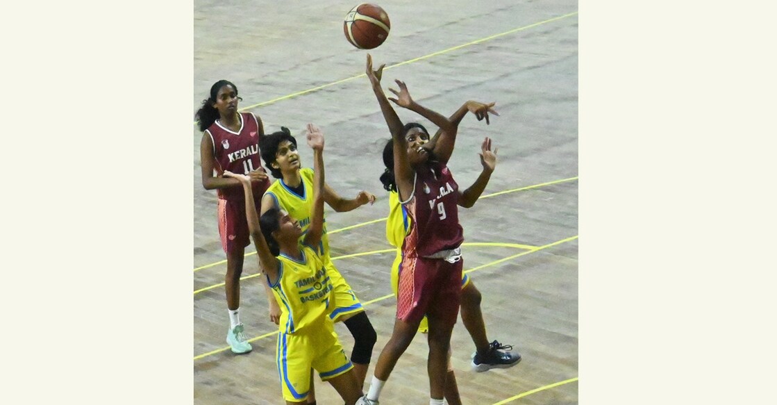 Action between Tamil Nadu (yellow) and Kerala in the semifinals of Youth National Basketball Championship in Kolkata. Photo: Special arrangement