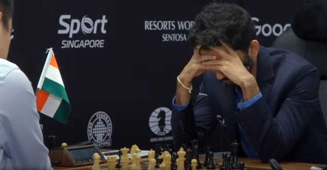 D Gukesh contemplates a move in Game 12 of the World Chess Championship against Ding Liren. Photo: Screengrab/FIDE