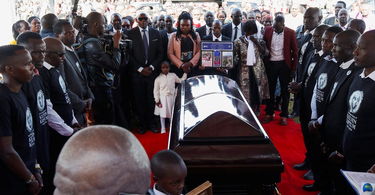 Family members surround the coffin of Kenya's marathon world record holder Kelvin Kiptum. Photo: Reuters/Monicah Mwangi