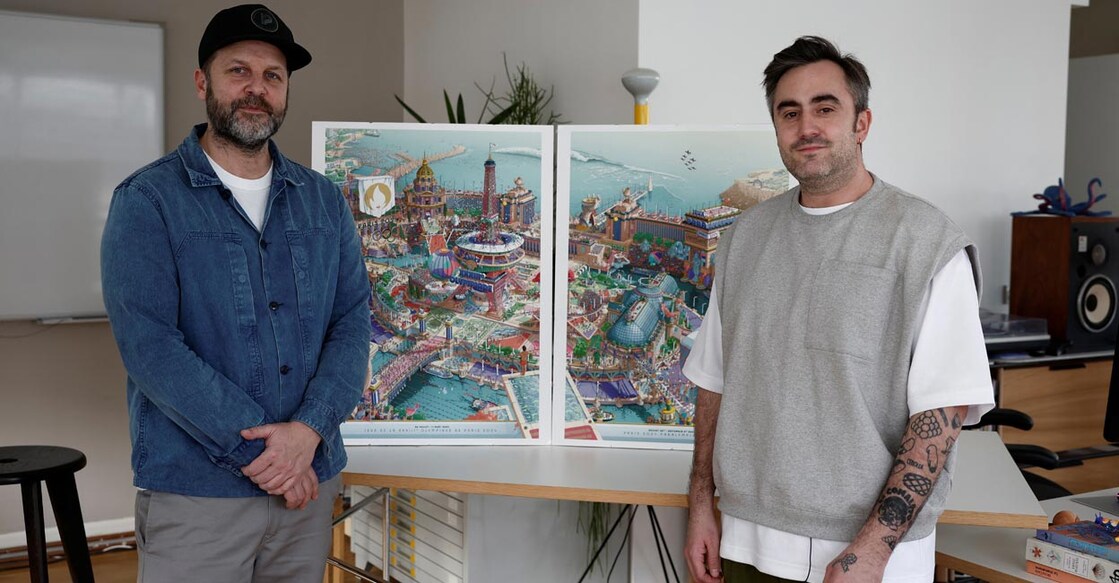 French artistic director Joachim Roncin and artist Ugo Gattoni present the official posters for the Paris 2024 Olympic and Paralympic Games near Paris. File photo: Reuters/Benoit Tessier