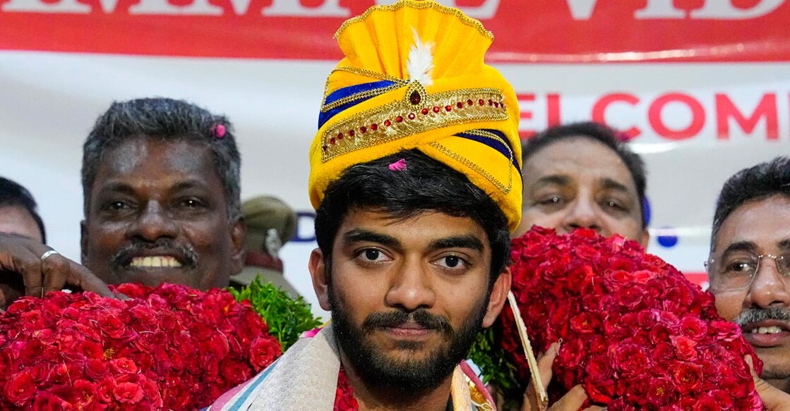 Gukesh being welcomed on his arrival at the Chennai airport. Photo: PTI/R Senthil Kumar