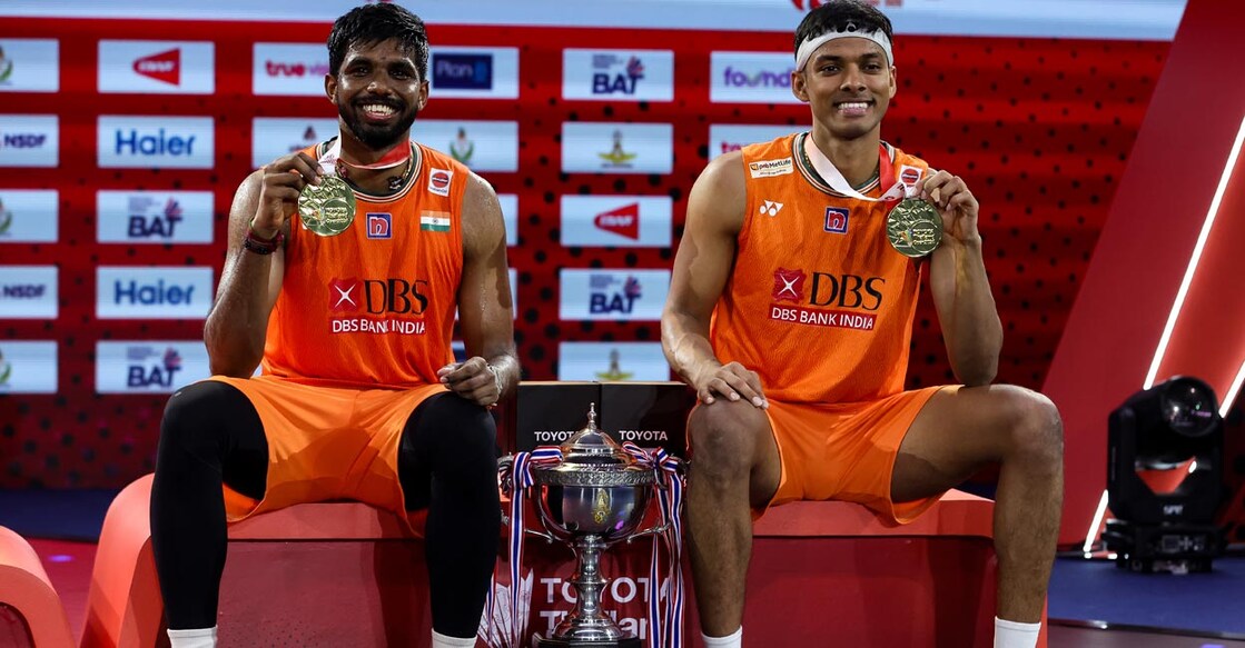 Satwiksairaj Rankireddy and Chirag Shetty pose with their medals and trophy. Photo: BWF/Badminton Photo 