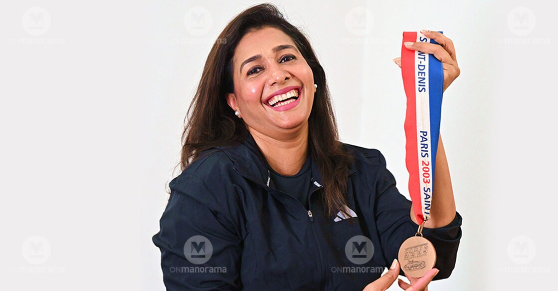 Anju Bobby George proudly displays her World Championships medal. Photo: Manorama/Manoj Chemancheri
