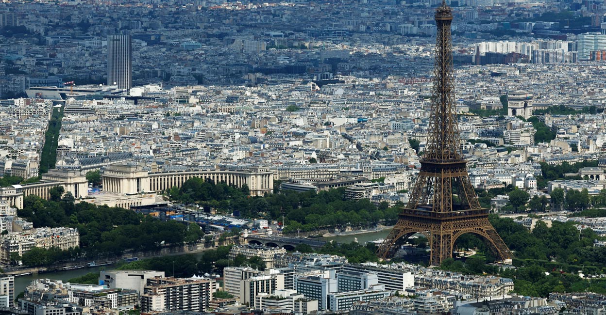 An aerial view shows the Eiffel Tower, Seine River, Trocadero Champions Par, and the city rooftops of residential apartment buildings ahead of the Paris 2024 Olympics. File photo: Reuters/Gonzalo Fuentes