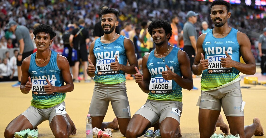 Frome left: Rajesh Ramesh,  V Muhammed Ajmal, Amoj Jacob, and Muhammed Anas celebrate their Asian record at the Budapest Worlds. File photo: AFP/Jewel Samad