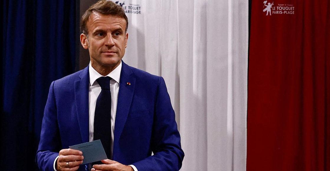 French President Emmanuel Macron visits a polling station in Le Touquet-Paris-Plage on June 30. File photo: Reuters/Yara Nardi