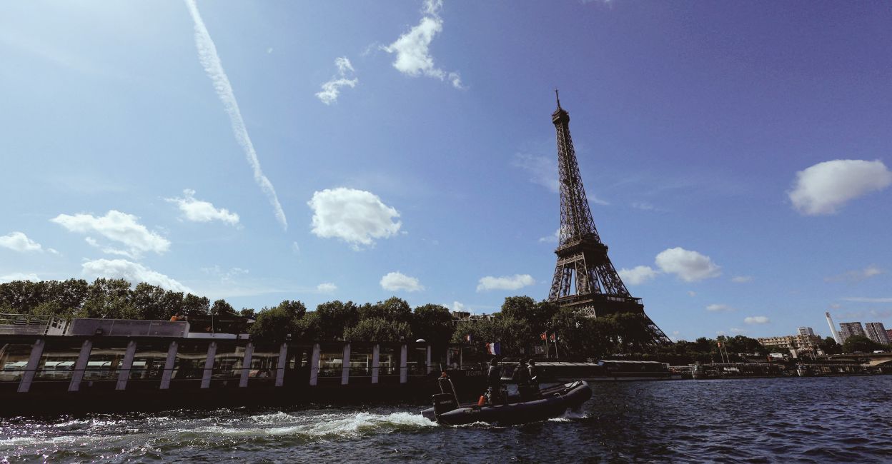 Untitled design - 1 The Eiffel Tower is seen in the background as Paris hold a technical test for boats as part of preparations for the river parade on the Seine for the opening ceremony of the Paris 2024 Olympic games. File photo: Reuters/Gonzalo Fuentes