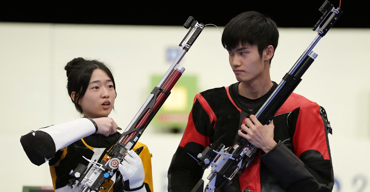Yuting Huang and Lihao Sheng Yuting Huang and Lihao Sheng after winning the gold medal. Photo: Reuters/Amr Alfiky