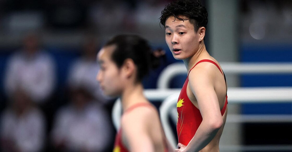 Yiwen Chen and Yani Chang of China before their dive. Photo: Reuters/Leah Millis