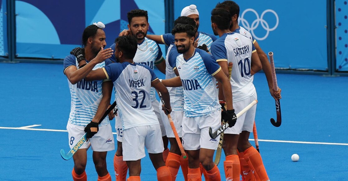 Indian players celebrate their first goal. Photo: AFP/Ahmad Gharabli