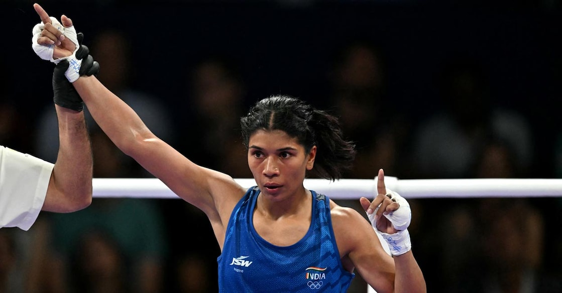 Nikhat Zareen celebrates her win. Photo: AFP/Mohd Rasfan