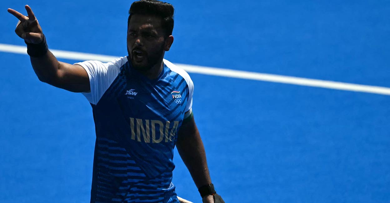Harmanpreet Singh celebrates scoring his second goal. Photo: AFP/Mauro Pimentel