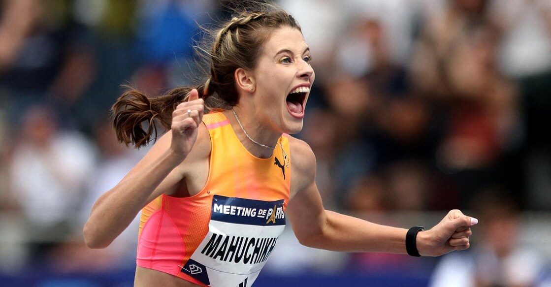 Ukraine's Yaroslava Mahuchikh celebrates after setting a new world record. Photo: Reuters/Manon Cruz