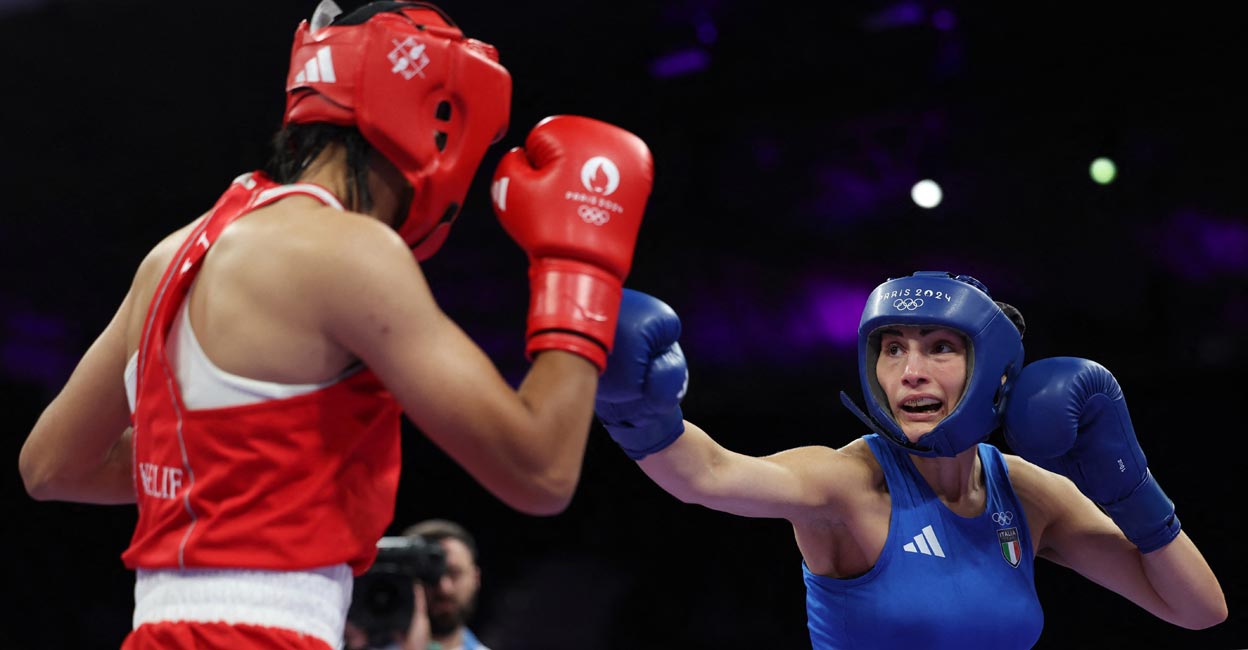 Angela Carini Angela Carini, right, in action against Imane Khelif of Algeria. Photo: Reuters/Isabel Infantes
