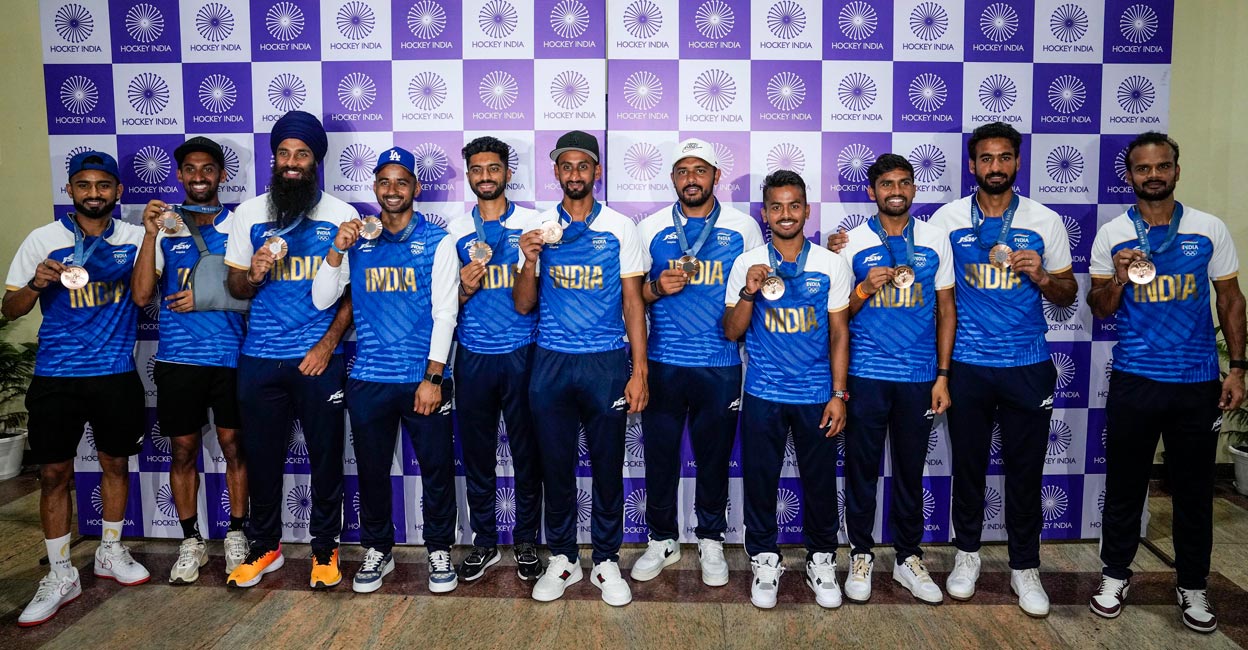 Indian hockey team Indian hockey team players pose for photos at the Major Dhyan Chand National Stadium in New Delhi. Photo: PTI /Manvender Vashist Lav