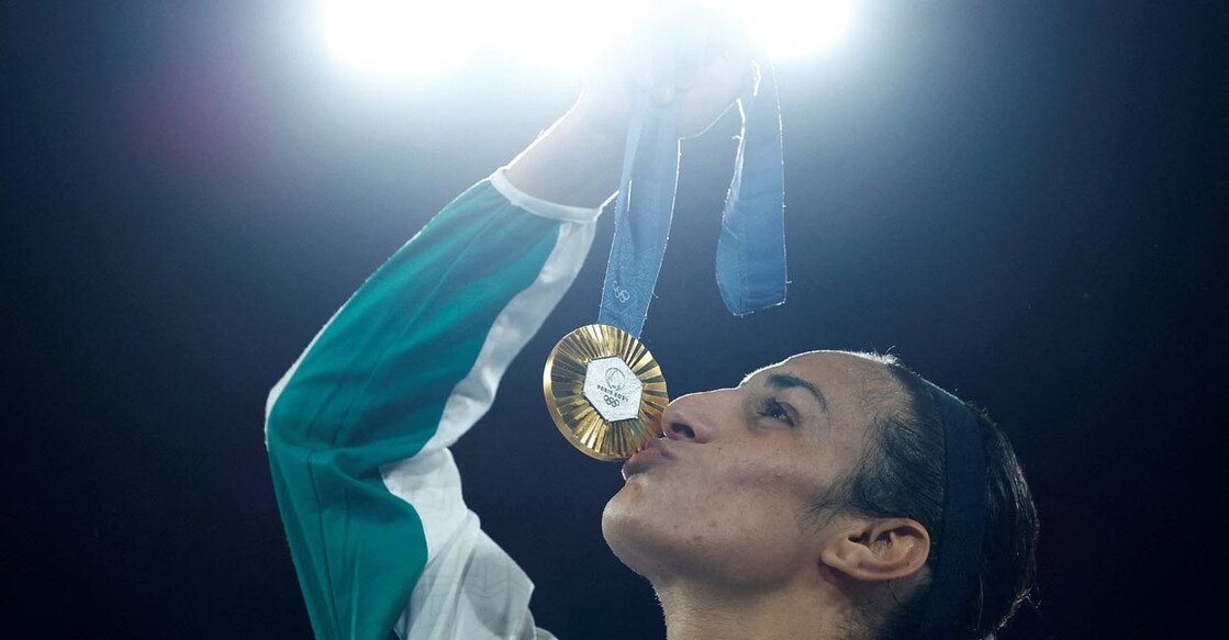 Imane Khelif celebrates with the gold medal. Photo: Reuters/ Peter Cziborra