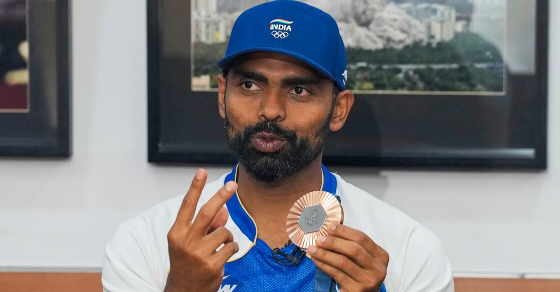 Sreejesh displays his bronze medal. File photo: PTI/Manvender Vashist Lav