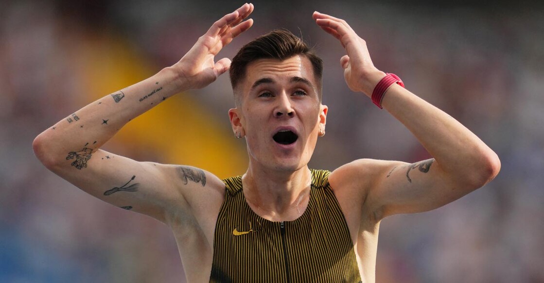 Jakob Ingebrigtsen celebrates after breaking the men's 3000m world record. Photo: Reuters/Aleksandra Szmigiel
