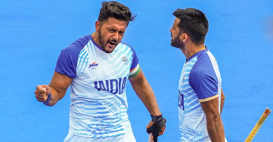 Indian captain Harmanpreet Singh, left, has been in red-hot form. File photo: PTI/Ravi Choudhary
