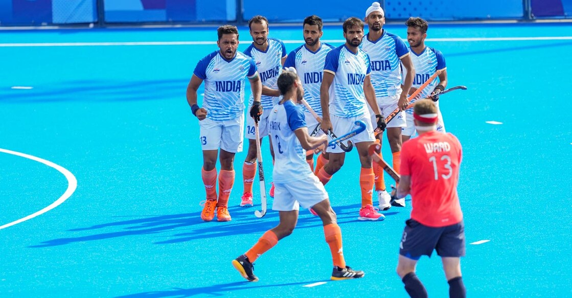Indian players celebrate their opening goal. Photo: PTI/Ravi Choudhary