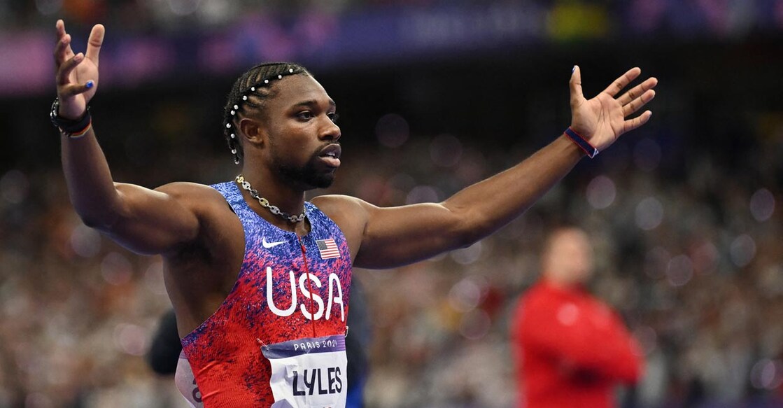 Noah Lyles reacts after crossing the finish line in first place. Photo: AFP/Martin Bernetti 